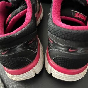 Nike Women’s Size 10 Sneakers with Pink and Silver Accents